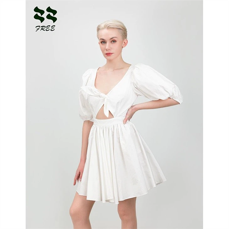 white dress with bow on front